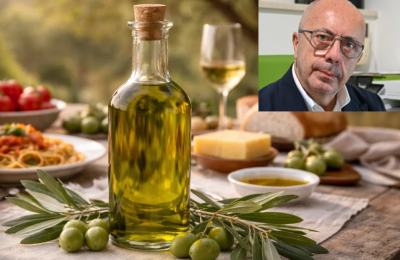 Una bottiglia di olio e Alberto Amoroso nel riquadro